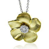 A Lustrous yellow gold flower pendant with 0.07 ct.white diam on 18 white gold chain