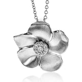 A Lustrous yellow gold flower pendant with 0.07 ct.white diam on 18 white gold chain