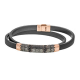 For the fashionable man this contemporary men's bracelet of black rubber has a zig zag design in titanium and rose gold, and highlighted by 0.19 ctw of black diamonds