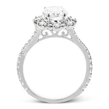 A geometric halo of diamonds in this Supernova Collection engagement ring replicates the effect of a thousand stars.