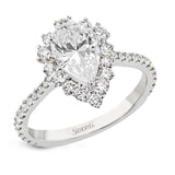This Supernova Collection engagement ring is built specially for a pear-shaped center stone, with a wonderful halo of diamonds twinkling like starry skies.