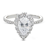 This Supernova Collection engagement ring is built specially for a pear-shaped center stone, with a wonderful halo of diamonds twinkling like starry skies.