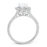 This Supernova Collection engagement ring is built specially for a pear-shaped center stone, with a wonderful halo of diamonds twinkling like starry skies.