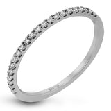 This new take on a classic engagement ring setting is part of our Underhalo Collection, where a circle of diamonds sits snugly around the side of the center stone, giving the perfect touch of sparkle from every angle.