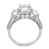 This impressive three stone ring design features a full 1ct total diamond weight on the sides of the center stone, along with .33 ctw of diamonds extending down the sides of the ring.