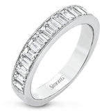 This gorgeous anniversary band is the perfect selection for those who seek a luxurious style to accompany any engagement ring, it features 1.06 cttw baguette diamonds with milgrain edges