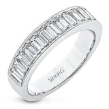 This sleek anniversary band features brilliant baguette cut diamonds 1.54 ctw., set with a delicate millgrain edge from our Simon set collection