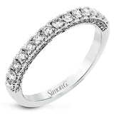 A classic, this 18K white gold diamond band features .57cttw white diamonds.