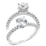 18K White Gold engagement ring featuring .29cttw diamonds. (center stone sold separately)