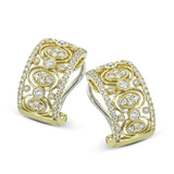 These stunning 0.70 ctw earrings in 18K yellow gold have a Byzantine quality and feature diamonds encircled in textured gold orbs, and framed by prong set diamonds.
