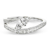 A marquise diamond set at an angle creates a contemporary look in this wonderful ring from our Lightning Collection.