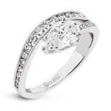 Bold shapes crafted in 18k white gold and diamonds make this ring unforgettable.