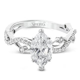 A unique twisting design on the band makes this engagement ring stand out from the rest. This particular style is made to perfect hold a marquise shaped center stone.