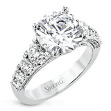 This bold 18K diamond engagement ring features 1.30 ctw of graduated round diamonds along the top & sides