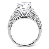 This bold 18K diamond engagement ring features 1.30 ctw of graduated round diamonds along the top & sides