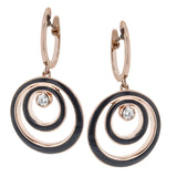 Bring on the Mod style with these round earrings that feel like a 60s throwback, with circles of enamel around central diamonds.
