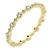 This diamond eternity band from our stackable collection in 14K yellow gold, has alternating bezel set diamonds 0.31 ctw. and gold beads.