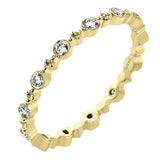 This diamond eternity band from our stackable collection in 14K yellow gold, has alternating bezel set diamonds 0.31 ctw. and gold beads.