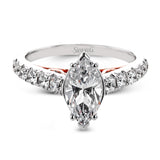 A touch of 18k yellow gold filigree on the interior of this ring adds a special touch to this 18k white gold engagement ring made for a marquise shape center stone.