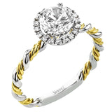 This ring is a twist on a halo engagement ring, with 18k yellow and white gold intertwining in the band.