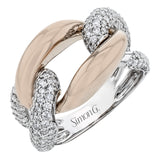 A modern two-tone right hand ring in 18K yellow and white gold, features interlocking links of high polish gold and two diamond links 1.11 ctw.