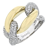 A modern two-tone right hand ring in 18K yellow and white gold, features interlocking links of high polish gold and two diamond links 1.11 ctw.