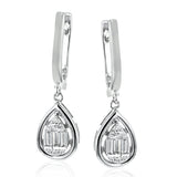 These WG teardrop dangle earrings are gleaming with round and baguette diamonds 0.06 D, 0.27 BG and are suitable for everyday wear