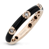 A sleek modern classic, this 18k gold and enamel ring contains .07 ctw of bezel set white diamonds.