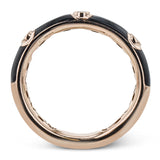 A sleek modern classic, this 18k gold and enamel ring contains .07 ctw of bezel set white diamonds.