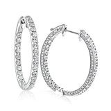 You can't go wrong with classic hoop earrings, especially these ones with diamonds inside and out that will sparkle in all directions.