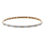 Stacked or worn alone, this enamel bangle provide the perfect touch, with .21 ctw of white bezel set diamonds.