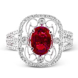 Delicate filigree adorns this vintage inspired ring, while a stunning gemstone center lends an essential dose of color.