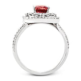 Delicate filigree adorns this vintage inspired ring, while a stunning gemstone center lends an essential dose of color.