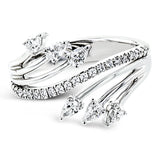 Lines of diamonds and gold wrap around your finger in this dynamic ring which combines round and pear shaped diamonds.