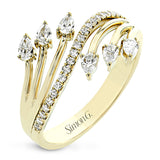 Lines of diamonds and gold wrap around your finger in this dynamic ring which combines round and pear shaped diamonds.
