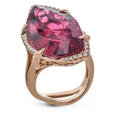 A one-of-a-kind 18k rose gold ring setting has been custom created for this stunning geometric 18.80 ct rubellite