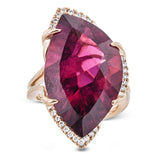 A one-of-a-kind 18k rose gold ring setting has been custom created for this stunning geometric 18.80 ct rubellite