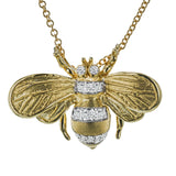 18K Yellow gold bee pendant has a brushed textured finish with 0.07 ctw diam and .02 ctw Rubies for eyes, on an 18 chain