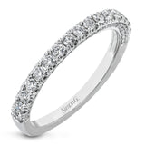 This wedding band is a classic choice with a straight design and .55 ctw of white diamonds.
