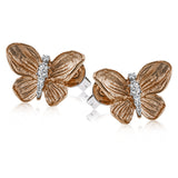These charming butterfly earrings alight on the ears, crafted in 18k yellow gold with .12 ctw of white diamonds.