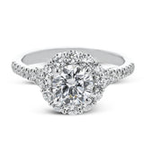 This lovely engagement ring provides an impressive amount of sparkle with .73 ctw in a halo design.