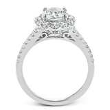 This lovely engagement ring provides an impressive amount of sparkle with .73 ctw in a halo design.