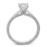 While lines of diamonds extending down both sides of this engagement ring, the round center stone is enhanced by the pure beauty of the 18k white gold on top.