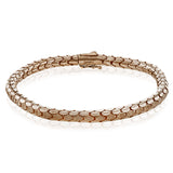 This smooth-linked men's bracelet is formed from 14k gold with a brushed finish.