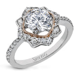 This detailed 18k white and rose gold ring design features .43 ctw of white diamonds.