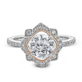 This detailed 18k white and rose gold ring design features .43 ctw of white diamonds.