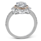 This detailed 18k white and rose gold ring design features .43 ctw of white diamonds.