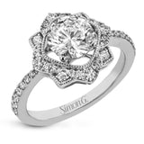 This detailed 18k white and rose gold ring design features .43 ctw of white diamonds.