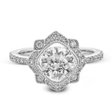 This detailed 18k white and rose gold ring design features .43 ctw of white diamonds.