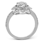 This detailed 18k white and rose gold ring design features .43 ctw of white diamonds.